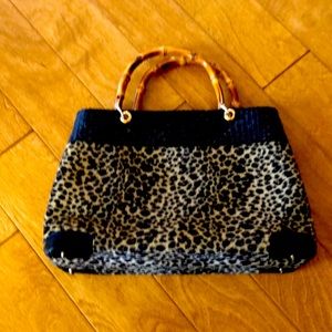 Rattan braided and animal print handbag.